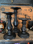 Three metal candle holders